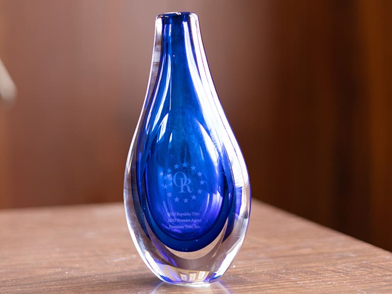 Blue tear drop award given to Premium Title Inc. in Dade City, FL